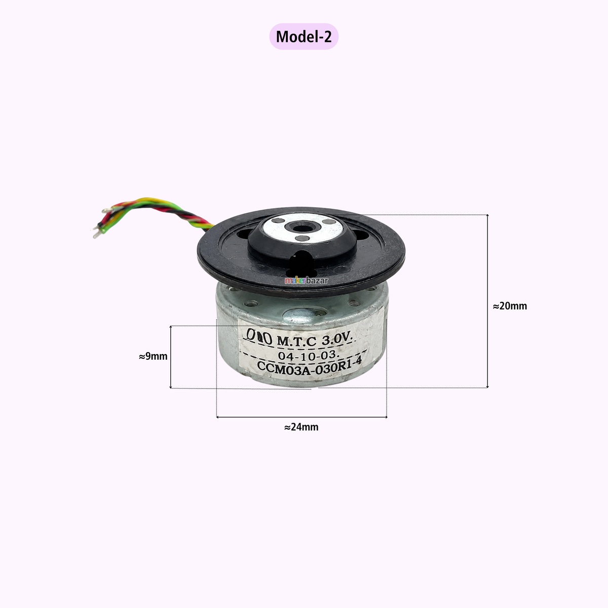 A small cylindrical electronic component labeled QAO M.T.