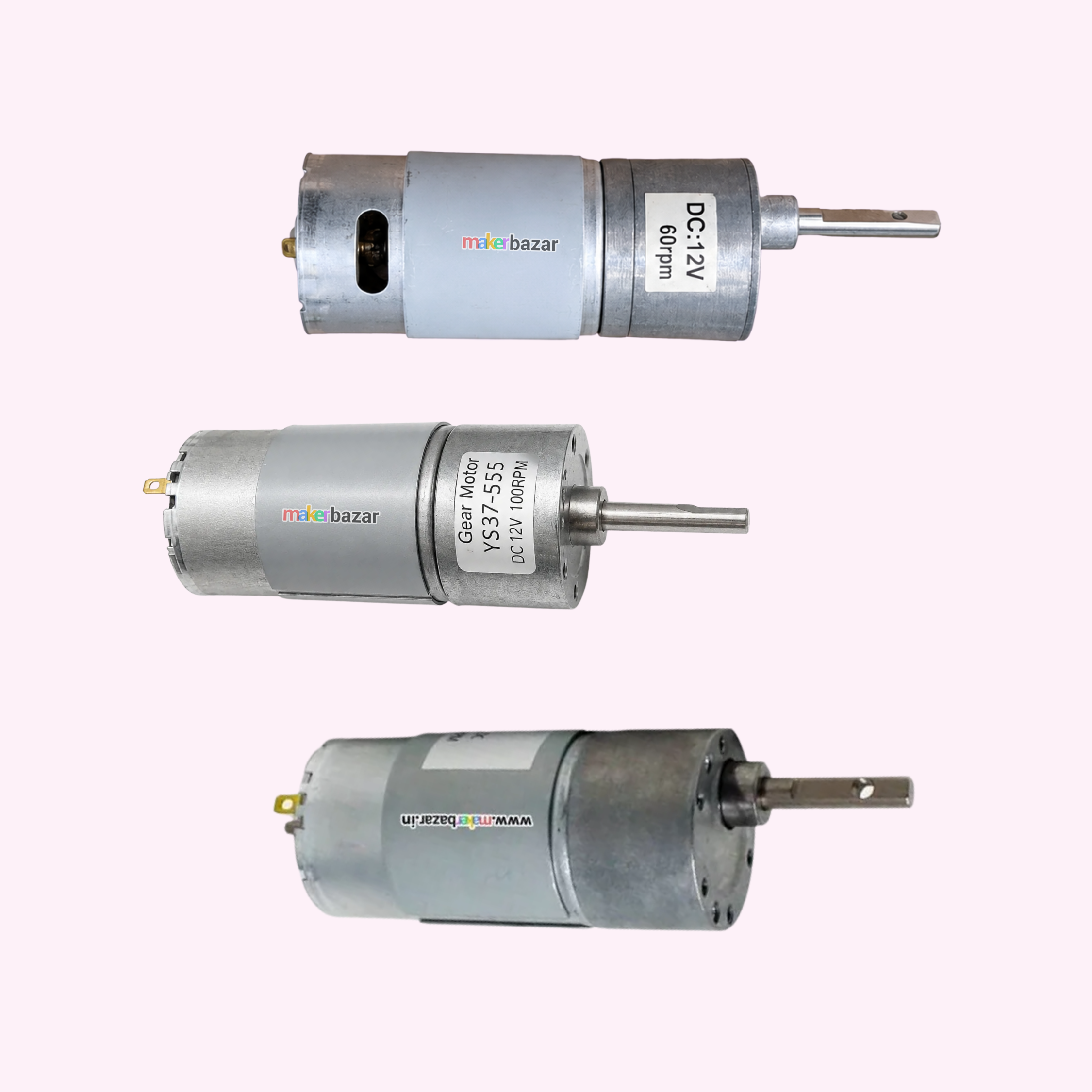 Three small cylindrical brushed DC motors shown horizontally on a pale pink background, with visible labels including 'm30 bazar' and 'DC12V'.