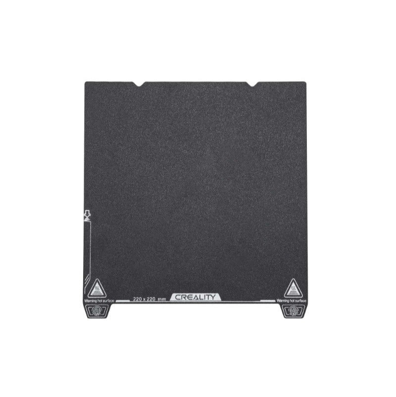 Black Creality 3D printer heating bed on a white background